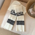 Fair Isle knit leg warmers in white with black snowflake patterns and ribbed cuffs - One Size / White