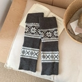 Fair Isle knit leg warmers in grey and white with snowflake patterns for winter - One Size / Gray