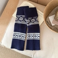 Navy blue Nordic leg warmers with white snowflake pattern in cozy knit winter style - One Size / Dark Blue
