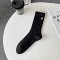 Men's black mid-calf cotton sports socks with white bird embroidery and ribbed knit texture - One Size / Black