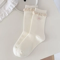 Calze a metà polpaccio in maglia bianco crema con bordi a balze e bottone a cuore - Bianco