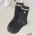 Dark grey knitted mid-calf socks featuring green ruffle trim and a white heart accent - Dark Gray