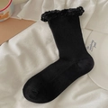 Solid black mid-calf sock with knit texture and ruffled crochet lace trim in retro style - One Size / Black