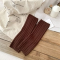 Deep brown ribbed knit leg warmers in a soft wool texture for cozy winter styling - One Size / Coffee