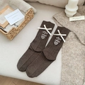 Dark brown crew socks with white silk bow and heart embroidery in cozy home setting - One Size / Coffee