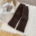 Thick dark brown ribbed knit leg warmers in a cozy aesthetic lifestyle setting - One Size / Coffee