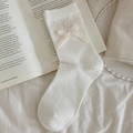 White ribbed knit calf socks with lace bow and flower button detail for women - White