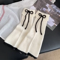 Scaldamuscoli in maglia crema stile JK con pizzo nero e fiocco in nastro raffinato - Taglia unica / Bianco