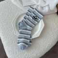 Calze medie a righe bianche e blu con ricamo a pinguino e bordo con volant decorativi - Taglia unica / Righe Blu Bianco Pinguino