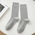 Classic light grey ribbed knit crew socks for women in a minimalist flat lay style - One Size / Light Gray