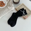 Japanese style black mid-calf socks with plaid bow tie and delicate scalloped trim details - One Size / Black