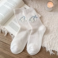 Creamy white mid-calf knit socks with cute cat pattern and blue ribbon bow accents - Off-white