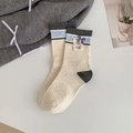 Calze beige in maglia con strisce blu e fiocco decorativo a quadri viola - Taglia unica / Bianco Sporco