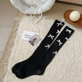 Knit over-the-knee socks in black with white ribbon bows and vertical ribbed texture - Black
