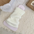 Cozy cream ribbed knit leg warmers in a flared style for a minimalist aesthetic - White