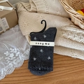 Calze lavorate a maglia grigio scuro con motivi a fiocco bianco e fascia in carta - Fiocchi Dappertutto (Grigio Scuro/Jacquard)