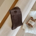 Dark brown ribbed knit mid-calf socks with decorative bow button and fold-over cuff design - Coffee