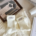 Cream white ribbed knit crew socks with a stylish folded cuff and woven label detail - One Size / White