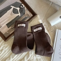Deep brown cotton ribbed crew socks for women featuring a minimalist white brand label - One Size / Coffee