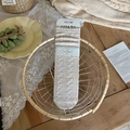 Beige crew socks with knit polka dot texture and premium branding in a rustic basket - One Size / Beige Khaki
