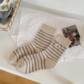 Beige mid-calf socks with brown stripes and Bee embroidery patch on a flat lay background - One Size / Khaki