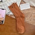Caramel mid-calf knit socks with ruffled edges and metal buttons for a chic autumn look - One Size / Orange