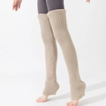 Detail of ribbed knit thigh high leg warmers in beige with stirrup heel design - One Size / Khaki