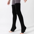 Long black ribbed knit leg warmers for women with stirrup design for yoga and outdoor wear - One Size / Black