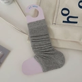 Grey vertical ribbed stirrup leg warmers on pink display card for ballet style - One Size / Light Gray