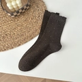 Dark brown polka dot crew socks with ruffle cuffs and cozy knitted cotton texture - Coffee