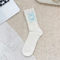 White Lolita lace crew socks featuring light blue silk bows and intricate knit patterns - Double Bow Style