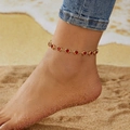 Charming gold chain anklet featuring multiple vibrant red heart-shaped crystal beads - Anklet / Red