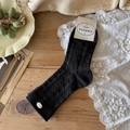 Calze nere con motivo jacquard 3D e dettaglio elegante con bottone in metallo ovale - Taglia unica / Nero