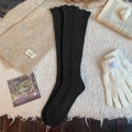 Chaussettes hautes noires pour femmes avec motifs ajourés élégants en tricot - Noir