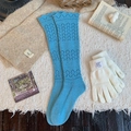 Lace-up knit over-the-knee socks in lake blue with elegant hollow-out wave patterns - Light Blue