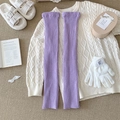 Lilac purple ribbed knit leg warmers in a cozy winter setting with plush accessories - One Size / Purple