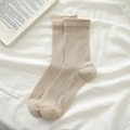 Calcetines minimalistas color albaricoque en algodón suave con puños acanalados - Marrón