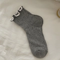 Gray cotton knit socks with sweet white ruffle trim and vertical ribbed texture - Dark Gray
