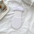Fantasmini bianchi in mesh traspirante con fiocco decorativo su supporto bianco - Taglia unica / Bianco