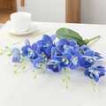 Artificial blue phalaenopsis orchid with 4 heads and realistic leaves on a white desk - 5-Branch Phalaenopsis / Blue