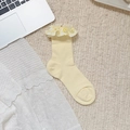 Pale yellow ballet style socks with ruffled lace edges and striped knit texture - Plaid Trim (Creamy Yellow)