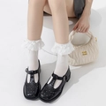 Elegant black Mary Jane shoes with T-strap and white lace socks on white platform - White