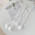 Minimalist white knit knee-high socks with vertical wavy texture and ribbed cuffs - One Size / Bleached White
