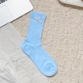 Light blue mid-calf sock with vertical ribbing and a delicate white lace bow detail - White with Bowknot