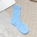 Sweet light blue ribbed calf socks featuring delicate floral patterns and a cute bow - Vertical Blue