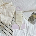 Beige ballet-style knit leg warmers with vertical ribbed texture on display card - One Size / Creamy White