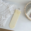 Pale yellow breathable mid-calf socks with delicate ribbon bow and knitted texture - One Size / Yellow