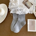 Grey lolita crew socks featuring white lace ruffles and cute silk bow details - One Size / Gray