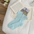 Light blue crew socks with ruffled cuffs and ribbon bow detailing in ribbed knit - Blue