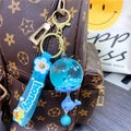 Luminous blue whale liquid keychain with glitter sand and honey wrist strap for bags - Blue Whale